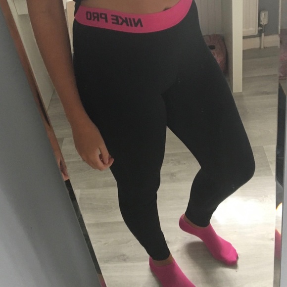 Nike Pants - Nike pro leggings full length with pink band.